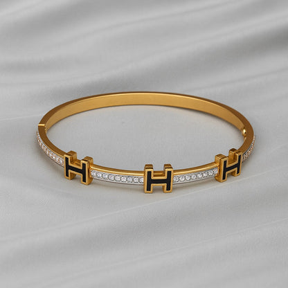 Luxury Gold-Plated “H” Designer Bangle with Black Enamel & Micro-Stone Detailing