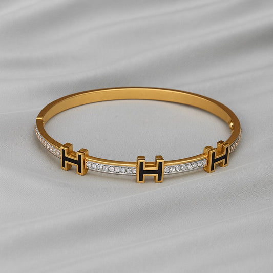 Luxury Gold-Plated “H” Designer Bangle with Black Enamel & Micro-Stone Detailing